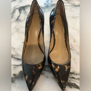 Tortoise patent leather pumps